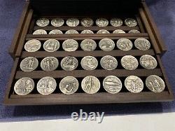 1970 Longines Symphonette Great American Triumphs 60 Coin Sterling Silver Set