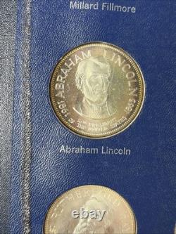 1970s FRANKLIN MINT COLLECTION of 36 PRESIDENT STERLING SILVER COINS in Binder