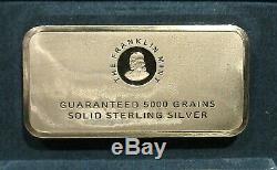 5000 Grains of Sterling Silver By The Franklin Mint Sealed In Lucite