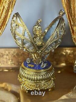 Faberge Sterling Silver Swan Lake Blue And Whie Enamel Egg withPearls And Saphire