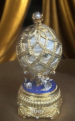 Faberge Sterling Silver Swan Lake Blue And Whie Enamel Egg withPearls And Saphire