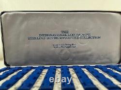 The Franklin Mint Sterling Silver International Locomotive Miniature Collection